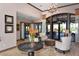Elegant clubhouse lobby with comfortable seating at 8744 Bellussi Dr, Sarasota, FL 34238