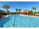 Enjoy this resort-style pool with shaded seating areas at 8744 Bellussi Dr, Sarasota, FL 34238