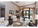 Bright and airy clubhouse lobby with seating at 8744 Bellussi Dr, Sarasota, FL 34238