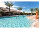 Gathering fun in the community's resort-style pool at 8744 Bellussi Dr, Sarasota, FL 34238