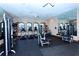 Fitness center featuring treadmills, ellipticals, and weight machines at 8744 Bellussi Dr, Sarasota, FL 34238