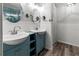 Primary bathroom with dual sinks and a walk-in shower at 6401 36Th W Ave, Bradenton, FL 34209