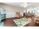 Relaxing Gathering room with hardwood floors and wicker furniture at 6401 36Th W Ave, Bradenton, FL 34209