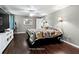 Primary bedroom featuring hardwood floors and ample space at 6401 36Th W Ave, Bradenton, FL 34209