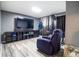 Game room with large screen TV and comfortable recliner at 6401 36Th W Ave, Bradenton, FL 34209