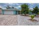 Charming single-Gathering home with a well-maintained front yard and paver driveway at 6401 36Th W Ave, Bradenton, FL 34209