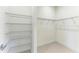 Walk-in closet with wire shelving and hanging rods at 12734 Rainwashed Loop, Parrish, FL 34219