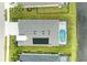 Aerial view of a home with a pool and solar panels at 12734 Rainwashed Loop, Parrish, FL 34219