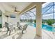 Screened pool and patio area with lake view at 12734 Rainwashed Loop, Parrish, FL 34219