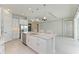Kitchen with large island, stainless steel appliances, and granite countertops at 12734 Rainwashed Loop, Parrish, FL 34219