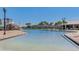 Large community pool with a waterslide and plenty of lounge chairs at 12734 Rainwashed Loop, Parrish, FL 34219