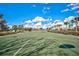 Full-size outdoor basketball court with painted lines and hoop at 12734 Rainwashed Loop, Parrish, FL 34219