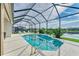 Relaxing screened pool with lake view at 12734 Rainwashed Loop, Parrish, FL 34219