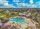 Community pool with water features, cabana and playground at 12734 Rainwashed Loop, Parrish, FL 34219