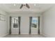 Spacious bedroom with tile floors and lots of natural light at 12734 Rainwashed Loop, Parrish, FL 34219