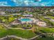 Community pool, playground, and nearby homes at 12734 Rainwashed Loop, Parrish, FL 34219