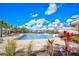 Community pool with a waterslide and plenty of lounge chairs at 12734 Rainwashed Loop, Parrish, FL 34219