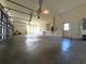 Spacious garage with high ceilings and ample storage space at 111 172Nd E St, Bradenton, FL 34212