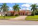 Mediterranean style home with lush landscaping at 111 172Nd E St, Bradenton, FL 34212