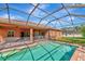 Enjoy this refreshing pool and patio with a screened enclosure at 111 172Nd E St, Bradenton, FL 34212