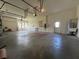 Spacious garage with high ceilings and ample storage space at 111 172Nd E St, Bradenton, FL 34212
