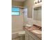 Clean bathroom, featuring a bathtub and granite countertop vanity at 2316 29Th W Ave, Bradenton, FL 34205