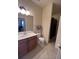 Cozy bathroom features a shower, bath, vanity, and tile floors at 7005 River Hammock Dr # 404, Bradenton, FL 34212