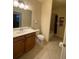 Bathroom features a single sink vanity and a tub and shower combination at 7005 River Hammock Dr # 404, Bradenton, FL 34212
