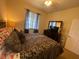 This is a basic bedroom with minimal furnishing and a small window at 7005 River Hammock Dr # 404, Bradenton, FL 34212