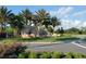 Community entrance with rock waterfall feature and the River Strand community name at 7005 River Hammock Dr # 404, Bradenton, FL 34212