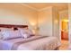 Comfortable main bedroom with neutral tones and ample natural light at 7005 River Hammock Dr # 404, Bradenton, FL 34212