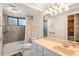 Clean bathroom with updated vanity and shower/tub combo at 1700 Glenhouse Dr # 406, Sarasota, FL 34231