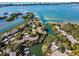 Aerial view showcasing waterfront community and marina at 1700 Glenhouse Dr # 406, Sarasota, FL 34231