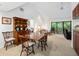 Spacious dining area with a wood table and chairs, located near kitchen at 1700 Glenhouse Dr # 406, Sarasota, FL 34231