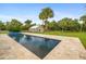 Inviting pool and spa with expansive yard at 7091 Saddle Creek Ln, Sarasota, FL 34241