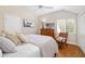 Bedroom with hardwood floors and dresser at 7091 Saddle Creek Ln, Sarasota, FL 34241