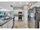 Bright kitchen with granite countertops and stainless steel appliances at 4457 Maywood Ln, North Port, FL 34286