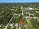 Wide aerial view showing the property's location and neighborhood context at 4457 Maywood Ln, North Port, FL 34286