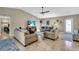 Comfortable living room with tile flooring and ceiling fan at 4457 Maywood Ln, North Port, FL 34286