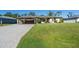Attractive single-Gathering home with a large grassy yard at 4457 Maywood Ln, North Port, FL 34286