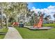 Playground with slides and play structures at 4807 Harvest Grove Pl, Parrish, FL 34219