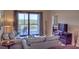 Bright living room with balcony access and water views at 7005 River Hammock Dr # 404, Bradenton, FL 34212