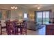 Living room and dining area with view at 7005 River Hammock Dr # 404, Bradenton, FL 34212