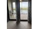 Spacious balcony with scenic water views and seating for two at 7005 River Hammock Dr # 404, Bradenton, FL 34212