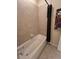 Clean bathroom with tub and shower at 7005 River Hammock Dr # 404, Bradenton, FL 34212
