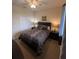 Bright bedroom with a double bed and closet at 7005 River Hammock Dr # 404, Bradenton, FL 34212