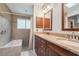 Updated bathroom with double vanity, granite countertops, and a shower/tub combo at 1411 70Th Nw St, Bradenton, FL 34209