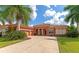Stunning curb appeal with mature landscaping at 111 172Nd E St, Bradenton, FL 34212