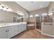Spa-like bathroom with double vanity and a large shower at 111 172Nd E St, Bradenton, FL 34212