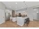 Modern kitchen with stainless steel appliances and an island at 111 172Nd E St, Bradenton, FL 34212